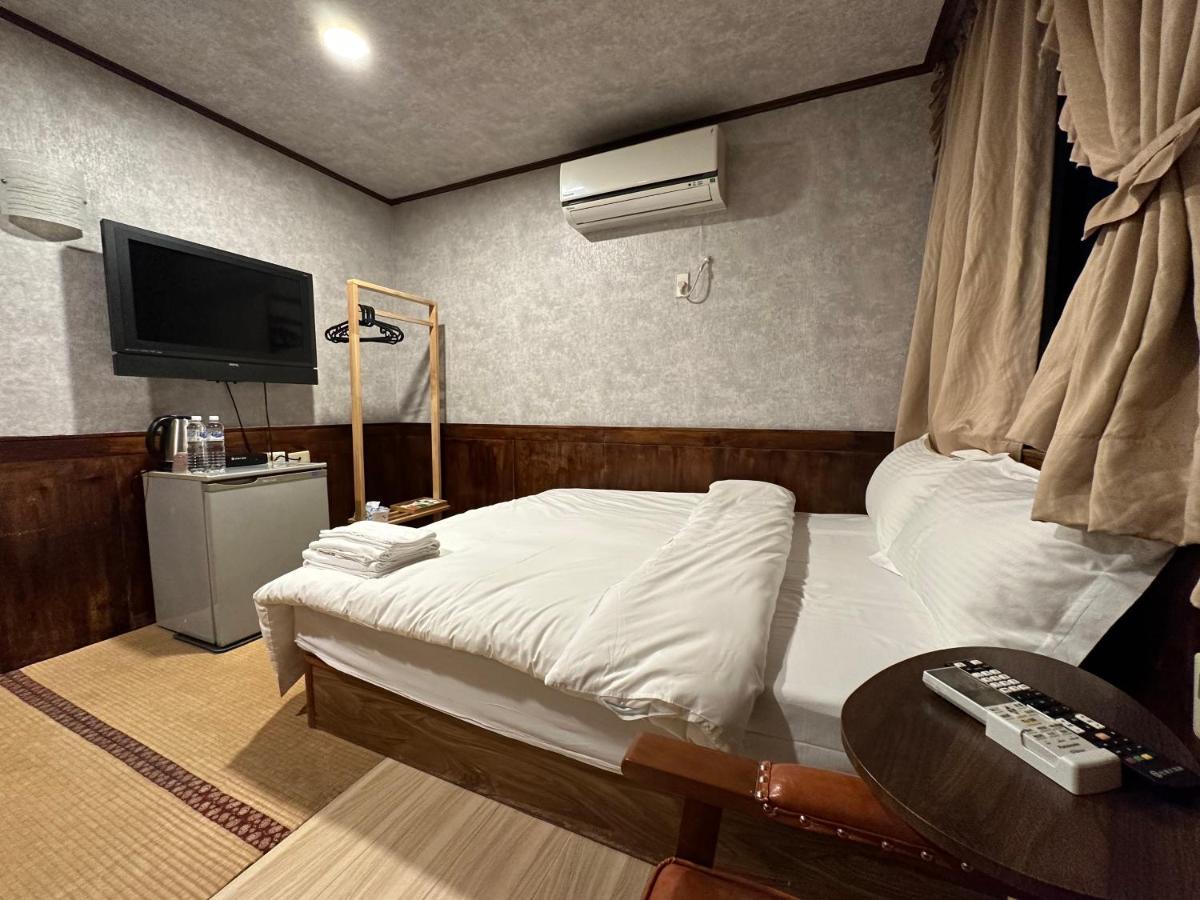 Ming Ren Hotspring Hotel Джиаоси Екстериор снимка